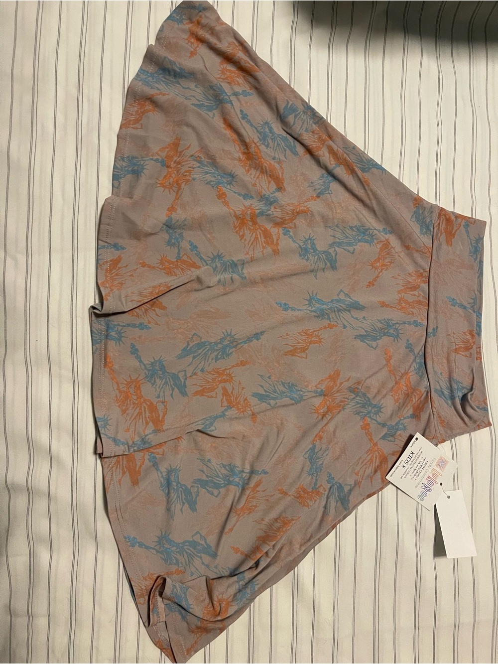 LuLaRoe Azure Kids Skirt in Taupe with Blue & Orange Accents